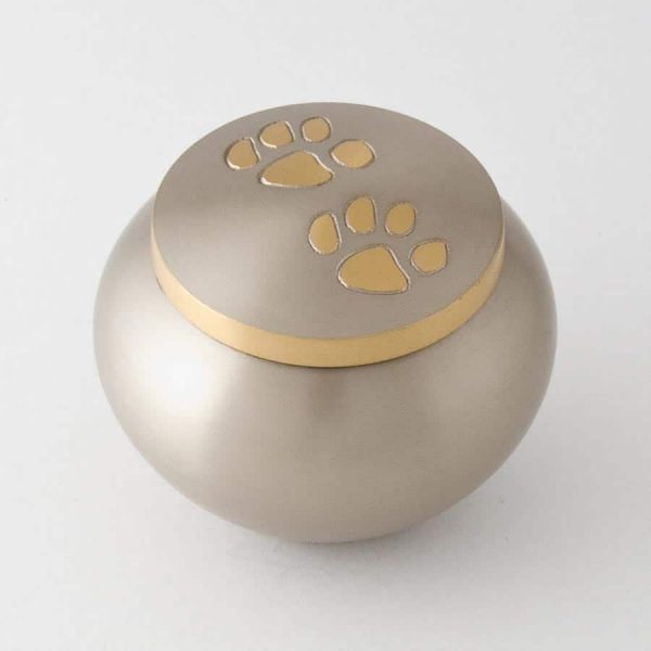 round with gold paw prints urn